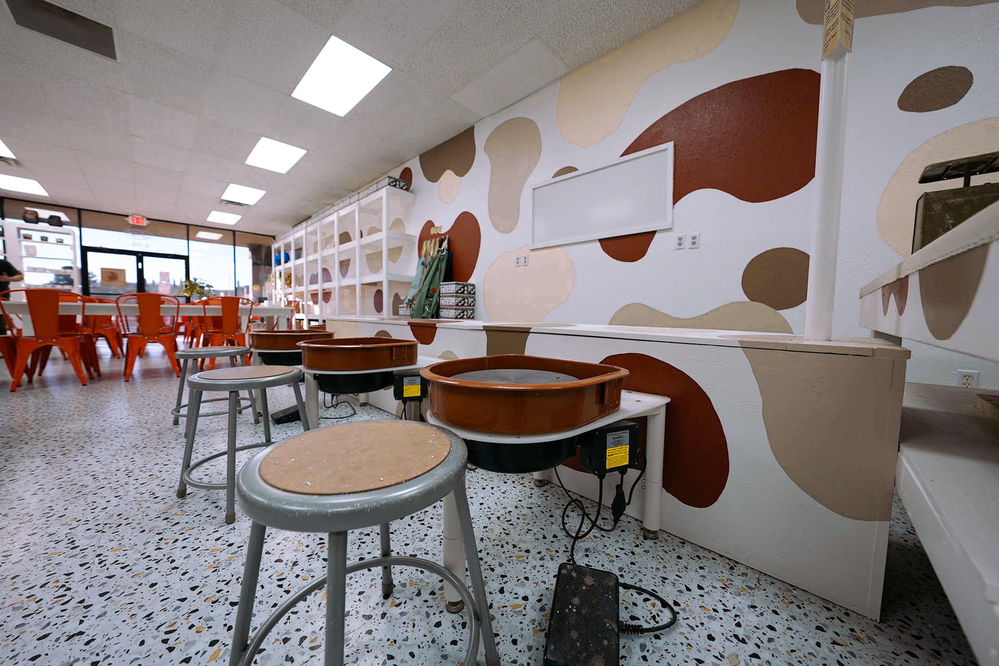 Open studio pottery workspace at Fired Up Clay Co. in El Paso, Texas